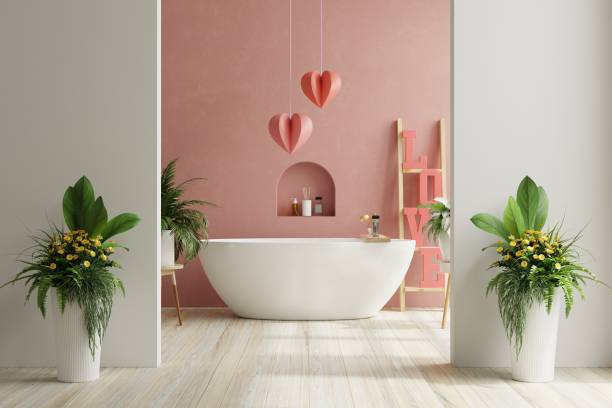 Baño con pared rosa